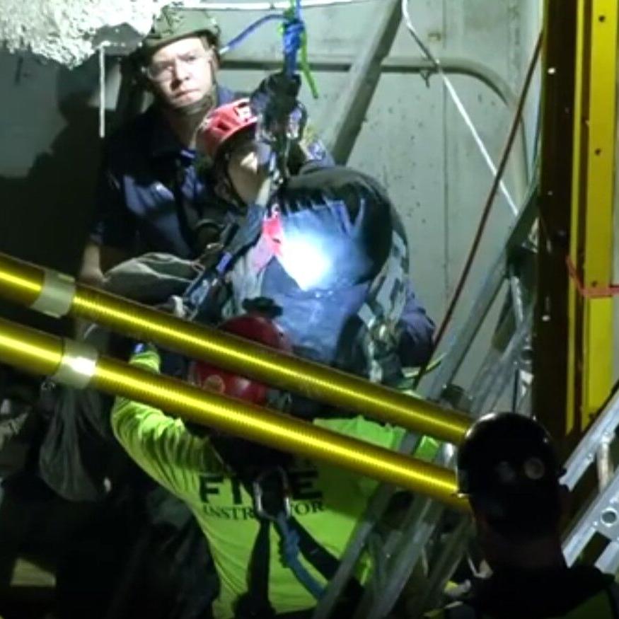 Man rescued from rubble.jpg